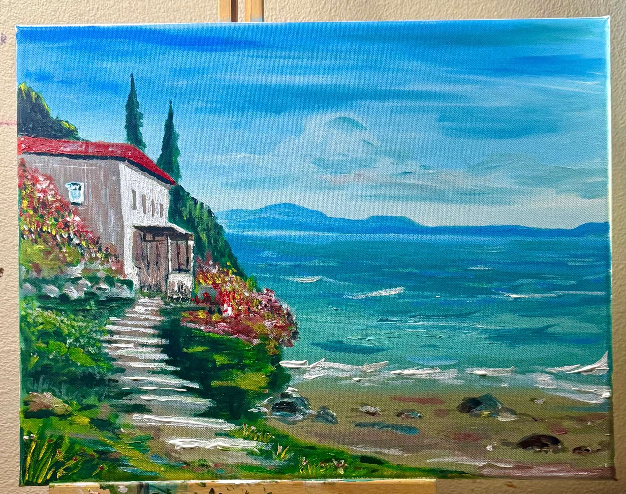 A colorful coastal town with beaches and flowers